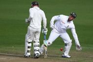 HAMILTON, NEW ZEALAND - MARCH 15:  Brendon McCullum of New Zealand makes his ground as Mark Boucher of South Africa fields during day one of the First Test match between New Zealand and South Africa at Seddon Park on March 15, 2012 in Hamilton, New Zealand.  (Photo by Hannah Peters/Getty Images)